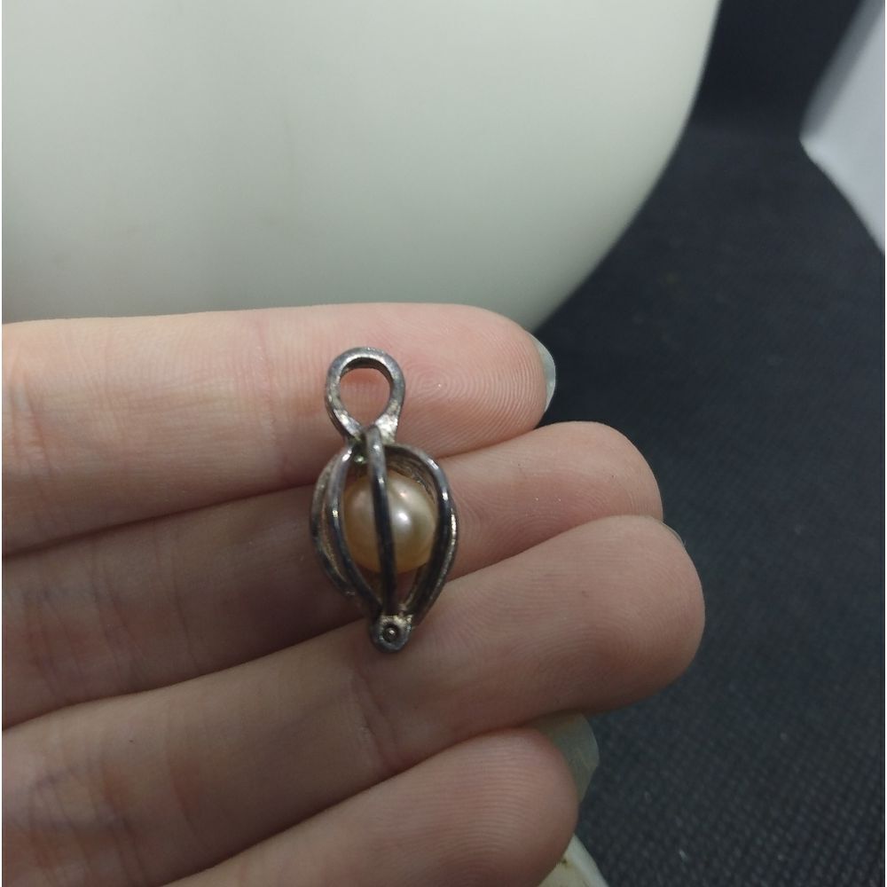 Natural peach pearl in silver shelled cage necklace‎ pendant